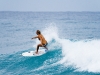 dome-beach-chick-surfing